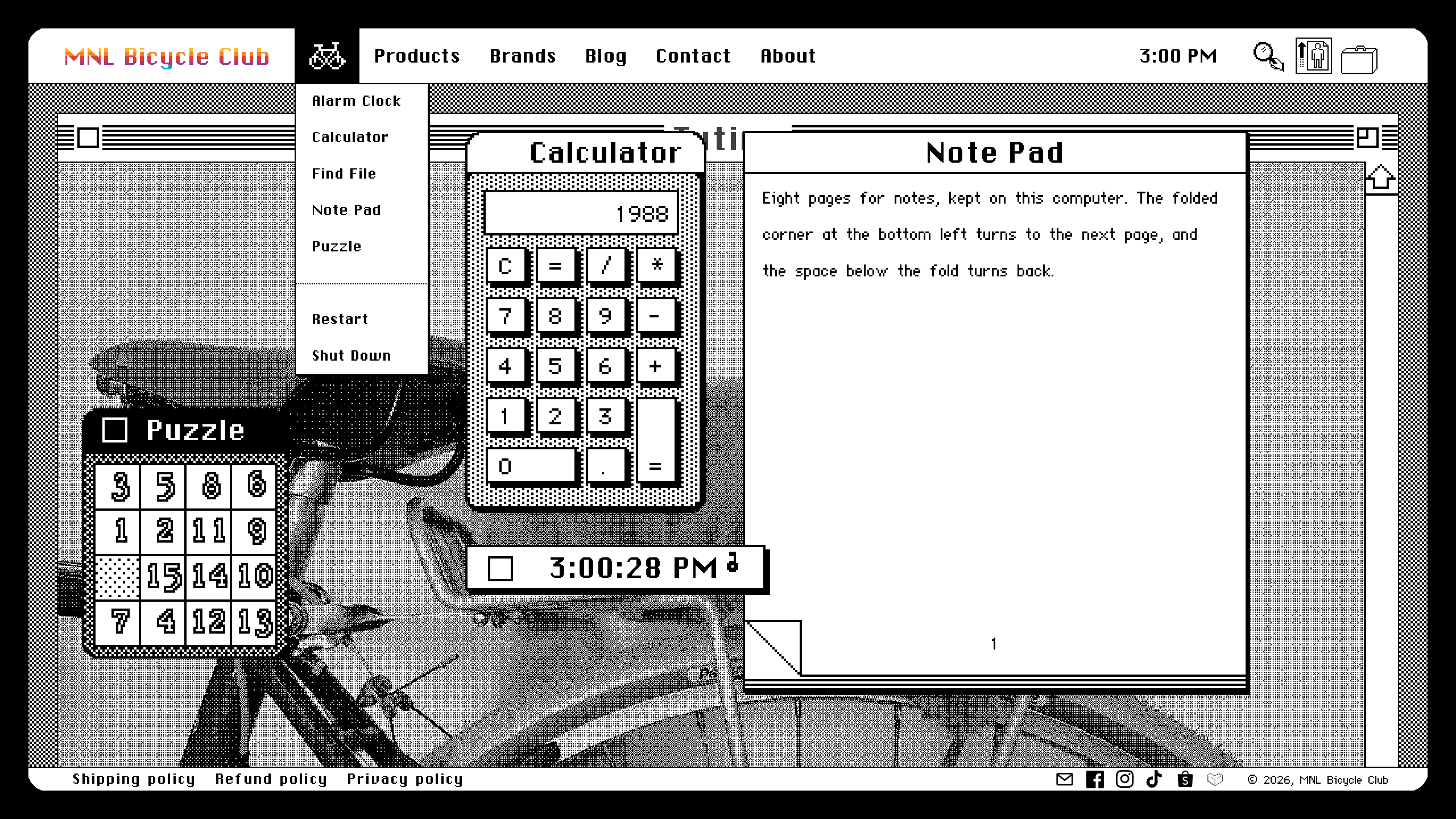 The bicycle menu pulled down beside the Calculator showing 1988, the Note Pad, the Puzzle and the Alarm Clock