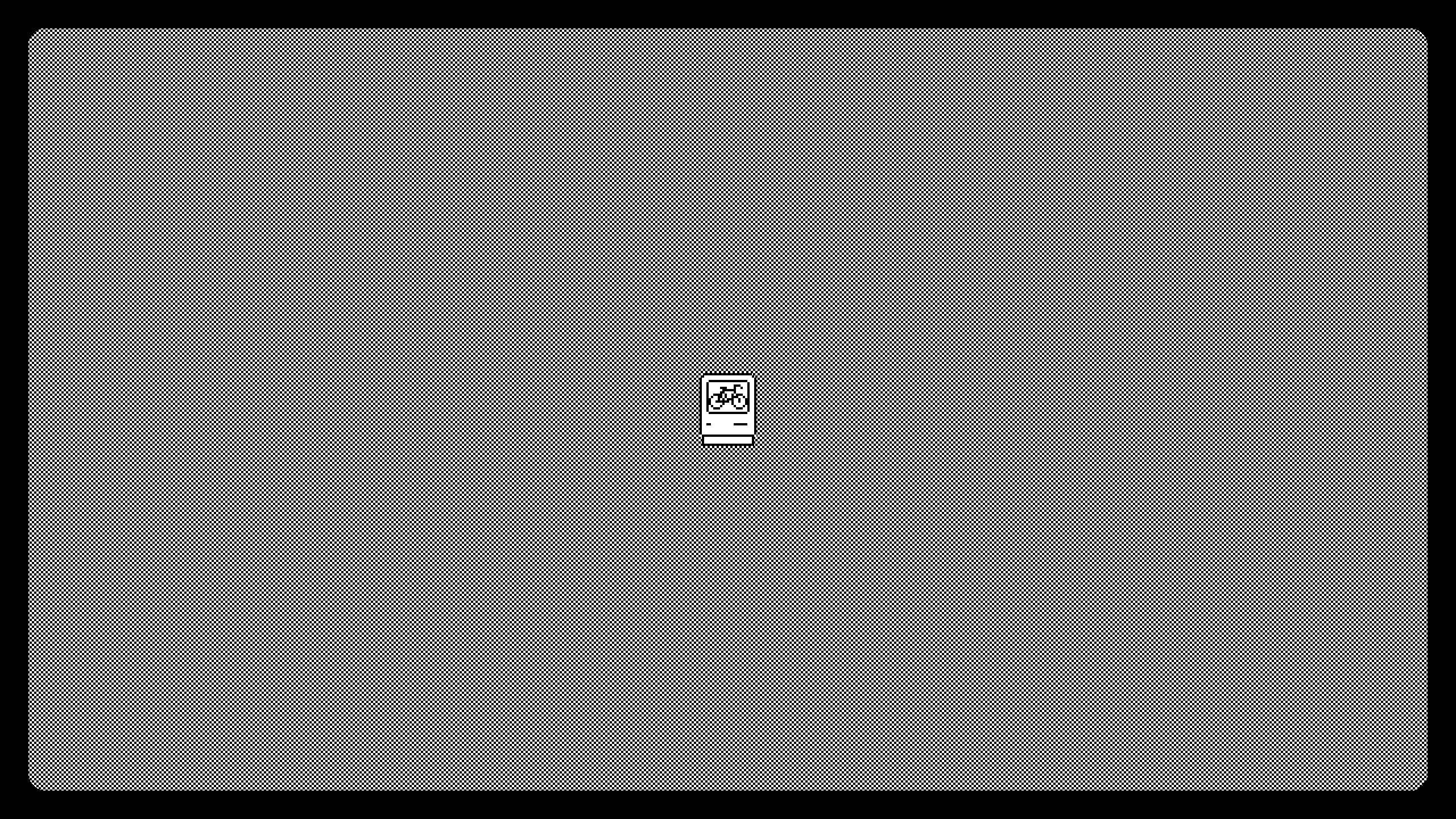 The startup screen: a Mac with a bicycle on its screen, in the middle of a grey desktop
